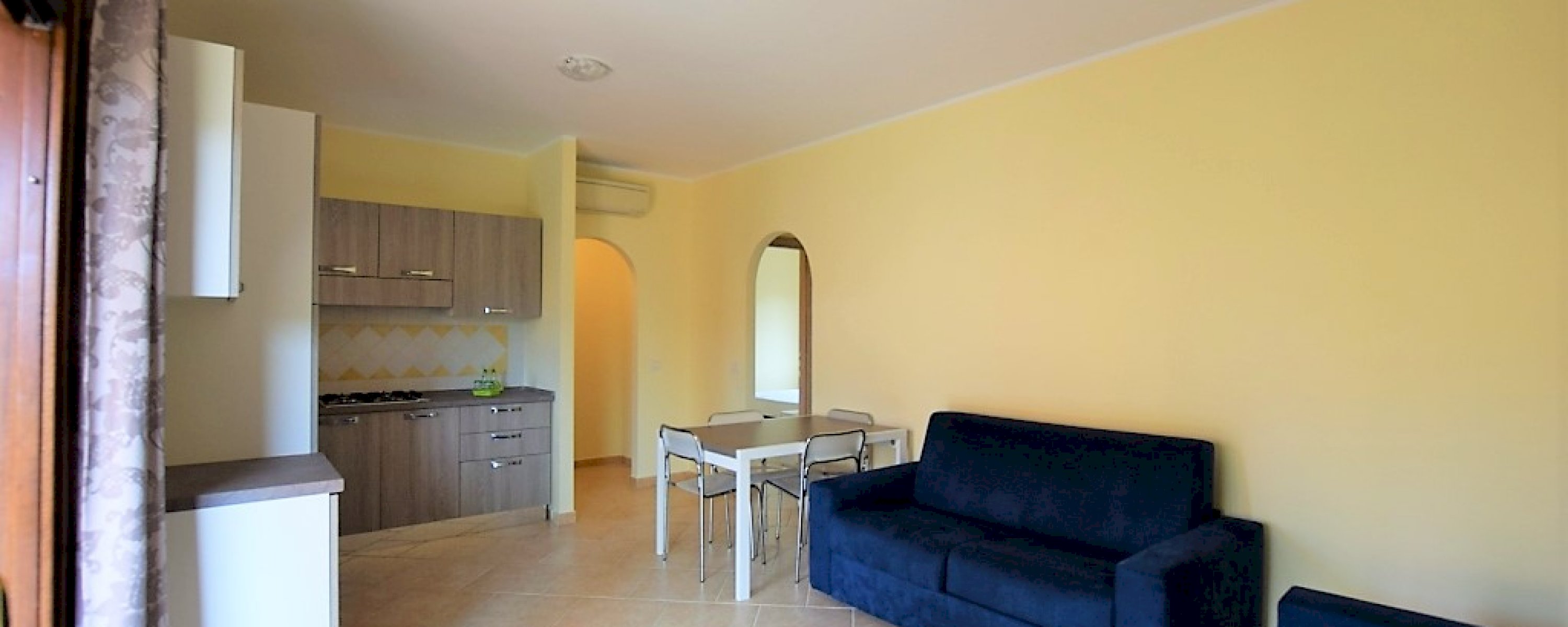 Baia Caddinas - Appartamento in residence fronte mare 